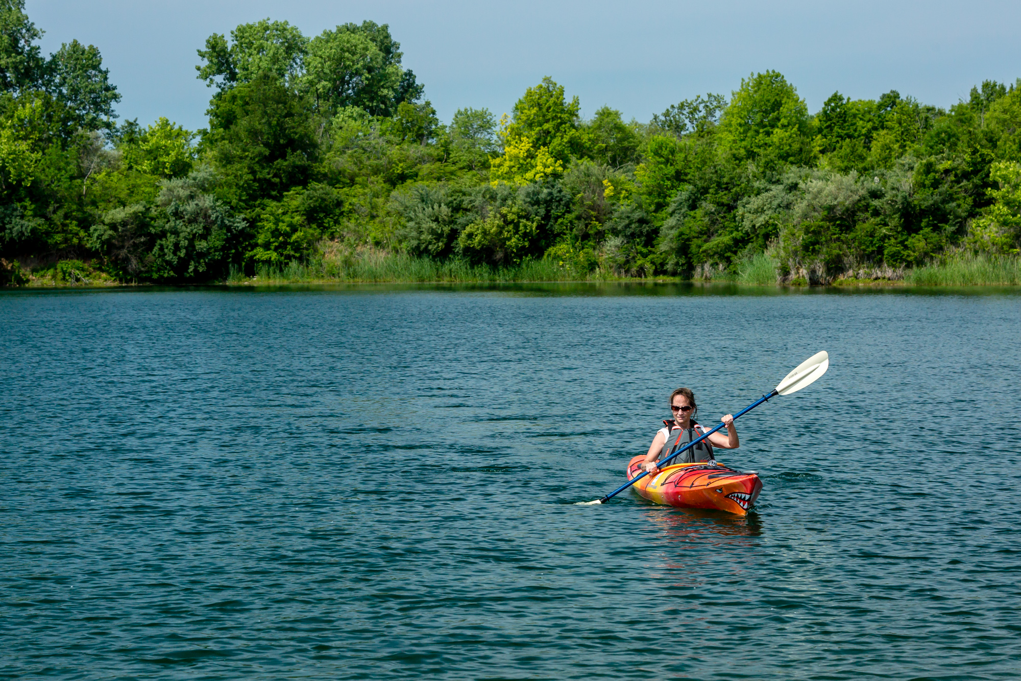 Woman Kayaking at River Bend Forest Preserve